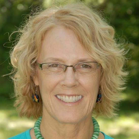 portrait of woman with medium-short blond hair