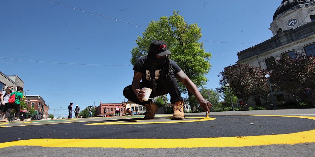 Column:  “Black Lives Matter” on a street mural is not a phrase for feeling good, but doing good