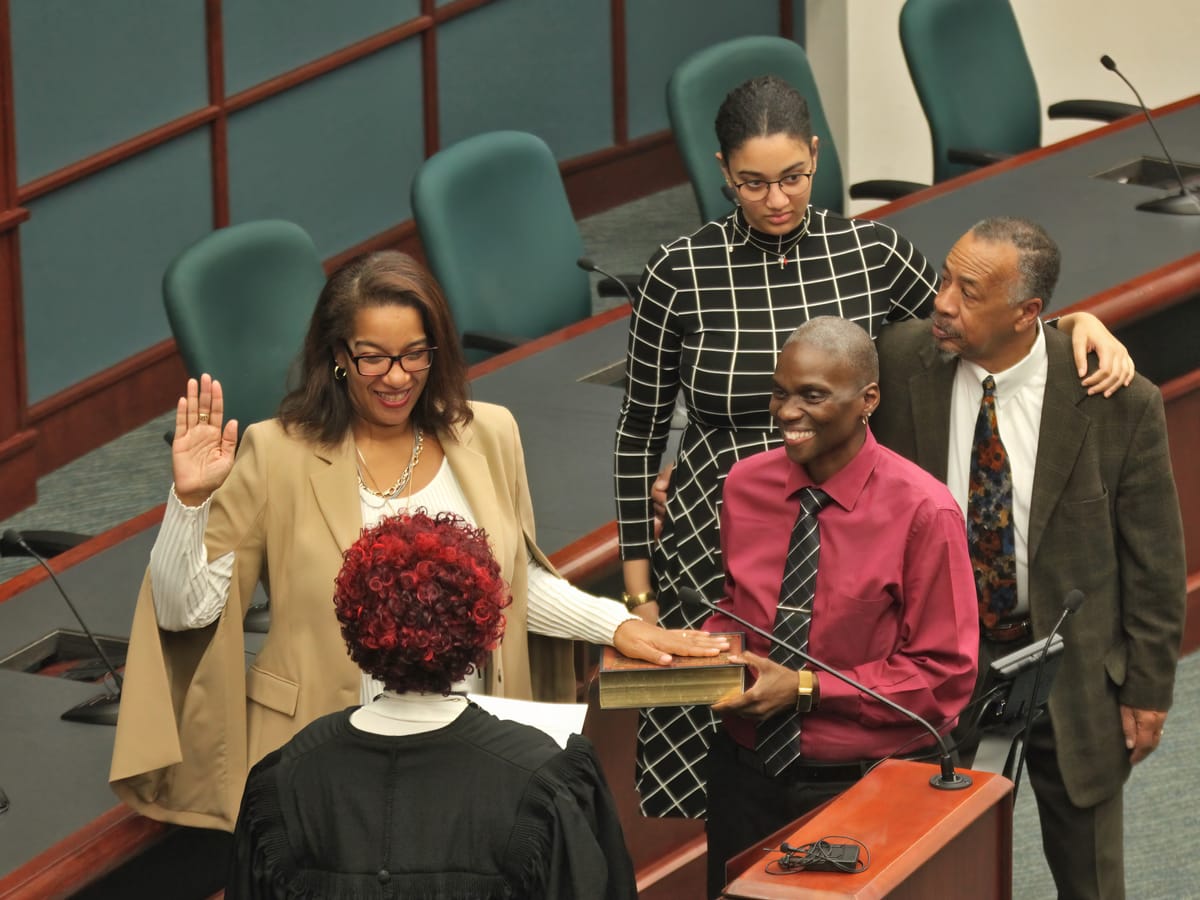 Local officials sworn in, Bloomington mayor Kerry Thomson says, “It’s time to get moving.”