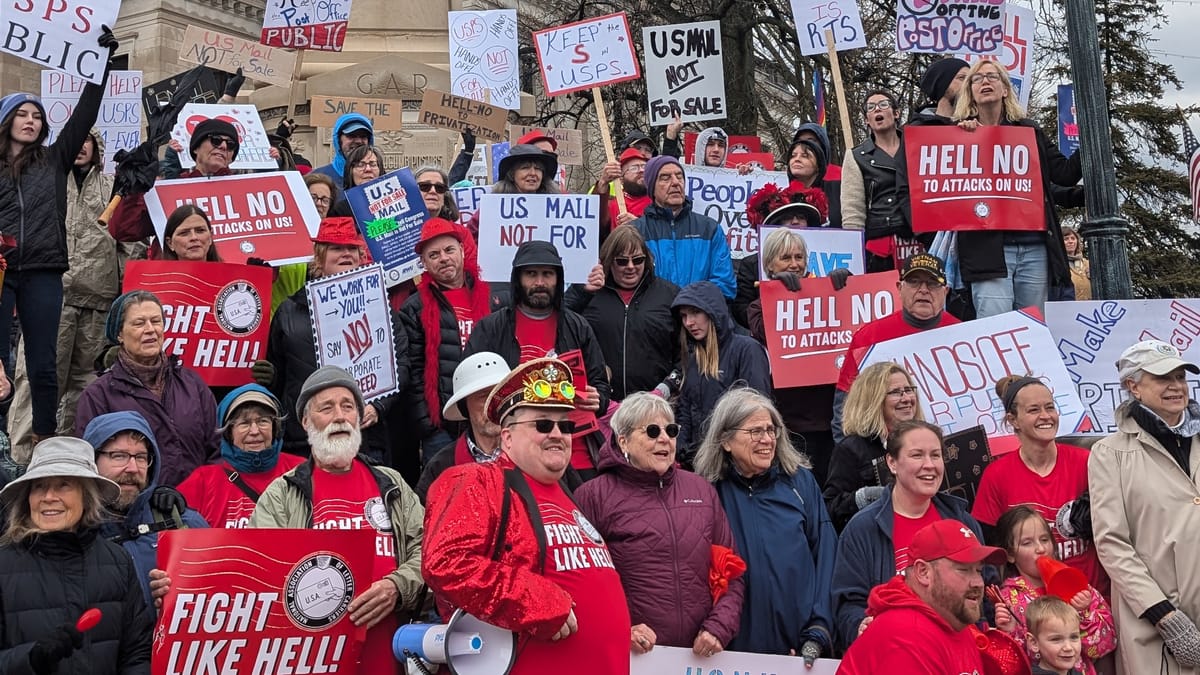 Protesters rally in downtown Bloomington against postal privatization: 'U.S. Mail is not for sale!'