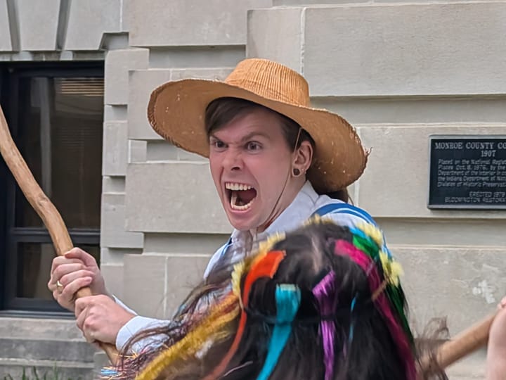 Bloomington's annual May Day ritual continues under watchful eye of weathervane fish